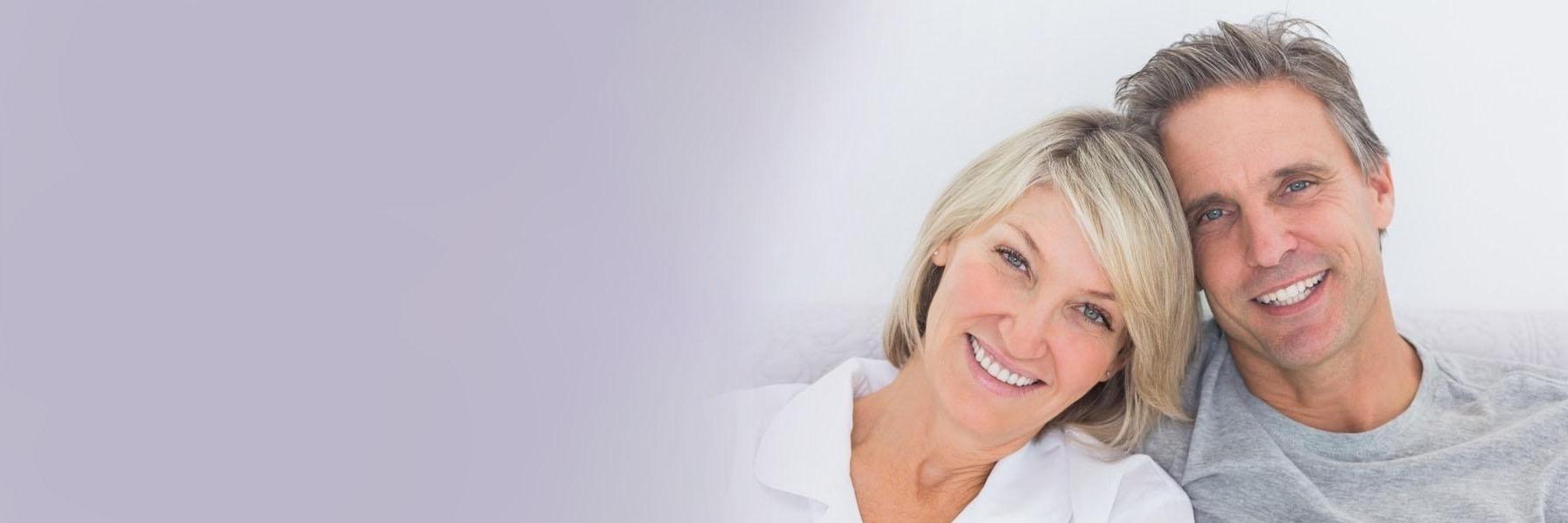 Couple smiling together | Tooth replacement Poway